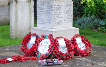 Southminster War Memorial with wreaths of poppies