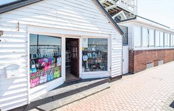 Traditional, white weatherboarded gift shop, Emporium on the Quay