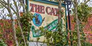Rustic sign for The Cats pub