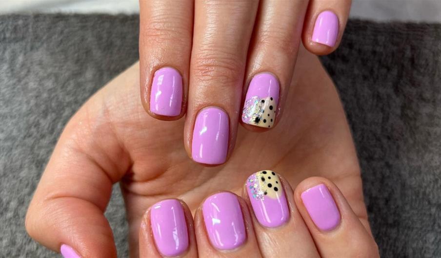 Pink decorated nail art from La Beauty Paradise