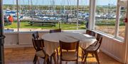 Inside table looking out over the marina at Harbour View