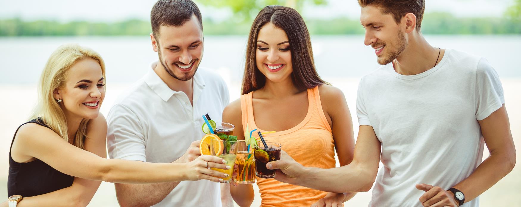 Friends enjoying drinks at open air bar