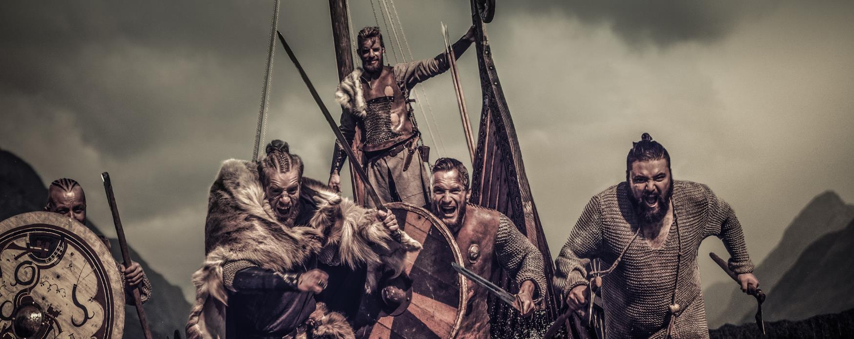A group of Vikings charging through water