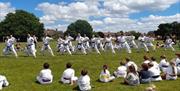 Students practising martial outside outside