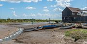 Boats and mudflats at Tollesbury, James Crisp