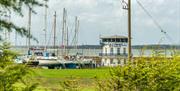 Bradwell Marina with Ross Revenge in background