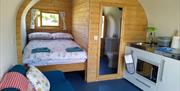 glamping pod, accommodation, inside pod, sofa, bed, ensuite bathroom, shower, kitchenette, Mundon, Maldon, Essex, Southey Creek Glamping