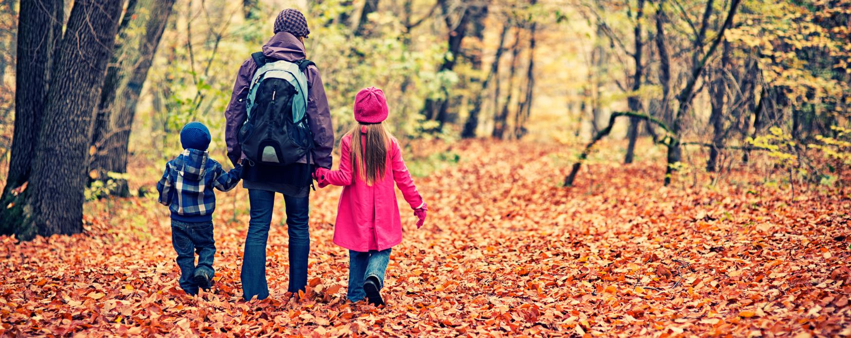 Family walking in autumn