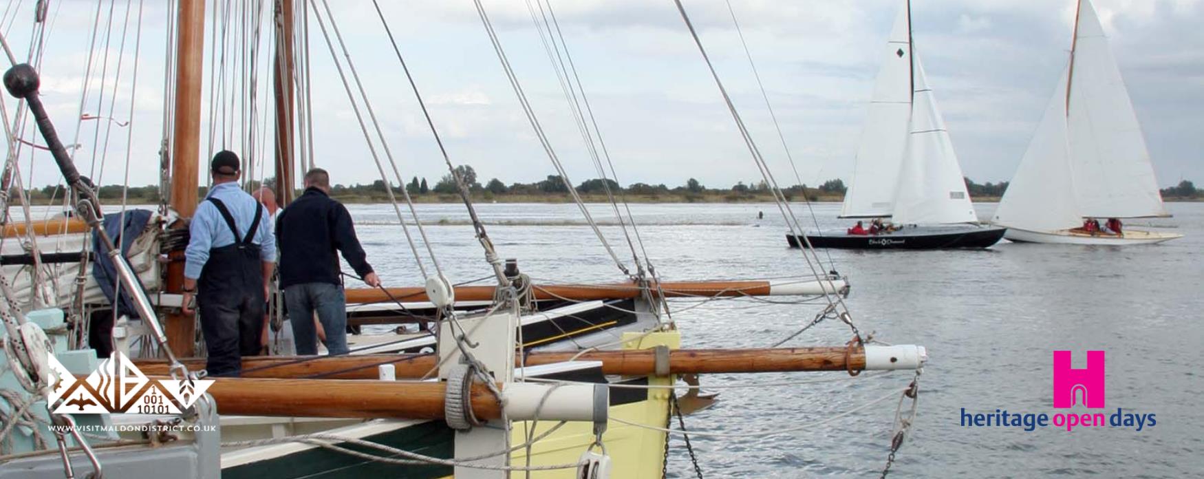 A group of sailors working aboard the Thames Barges moored at Hythe Quay in Maldon
