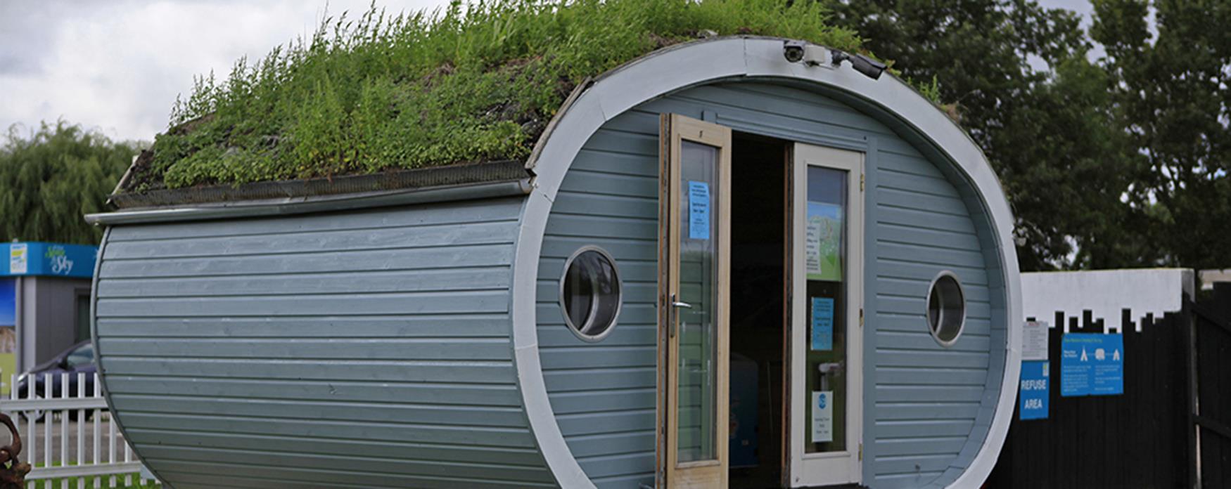 unusual accommodation - grass covered hut - osea leisure park