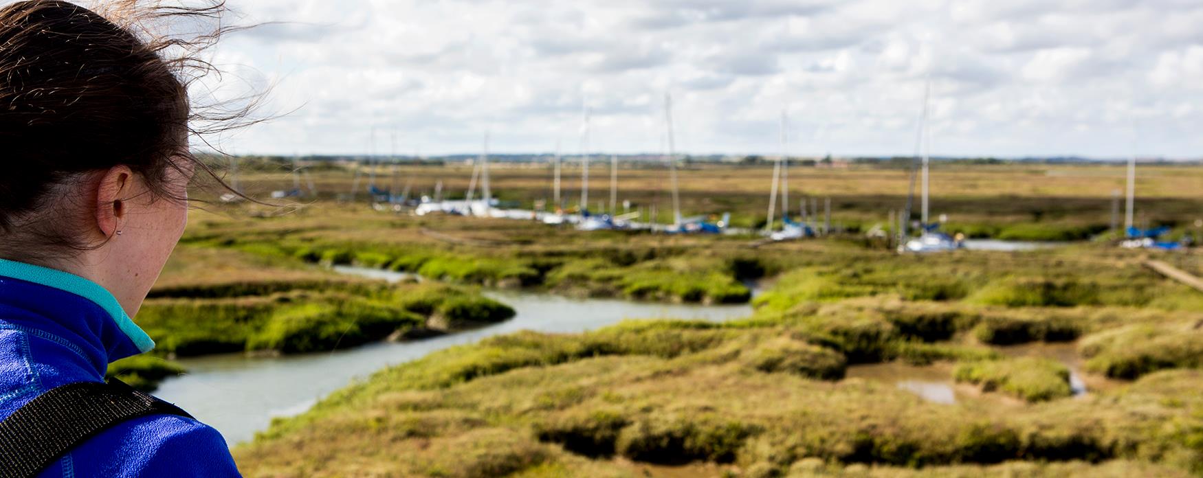 A view of the saltmarsh and boats in Tollesbury