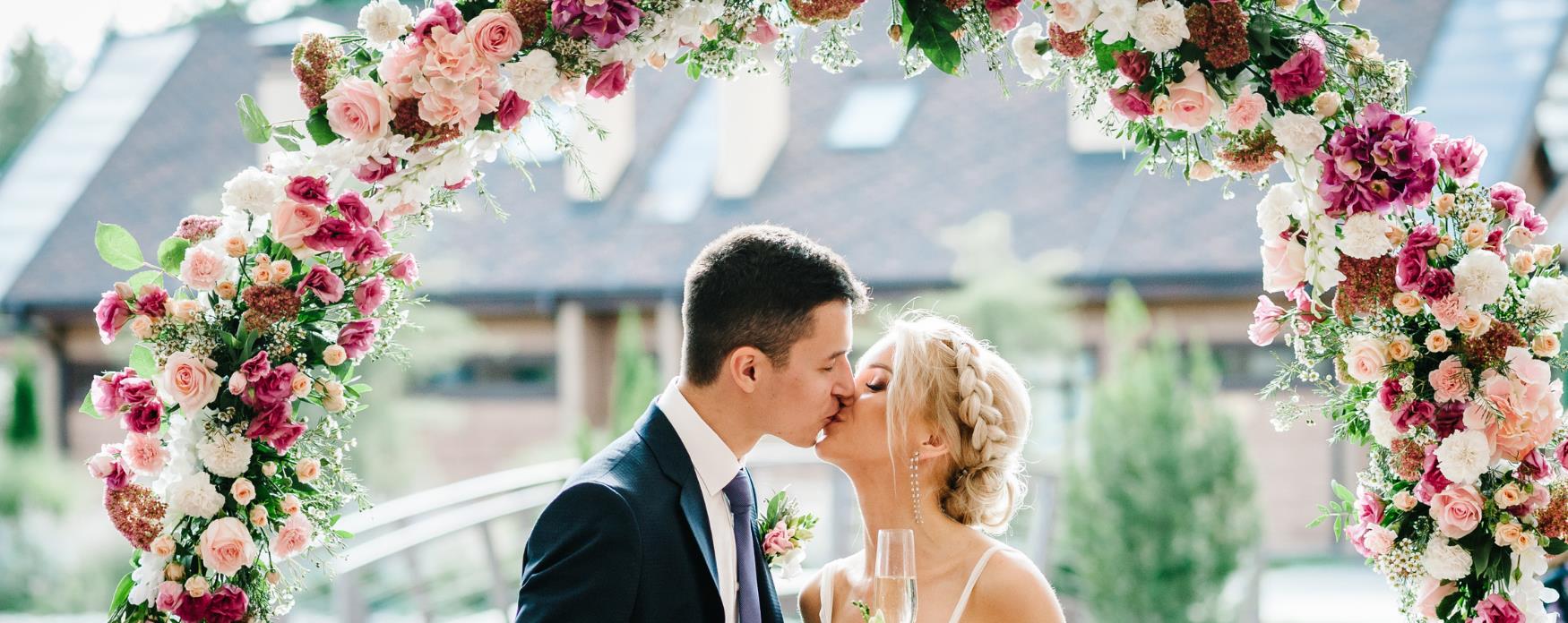A bride and groom kissing