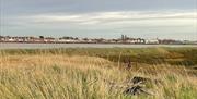 View back across the Crouch to the Royal Corinthian Yacht Club from Wallasea Island, by Carina F