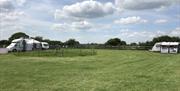Spacious field at D'Arcy Equestrian Camping and Caravanning Club site