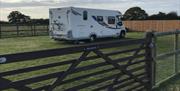 The Paddock is a fully enclosed camping pitch ideal for dog owners, suitable for two caravans/campers