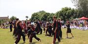 Students practising martial arts outside