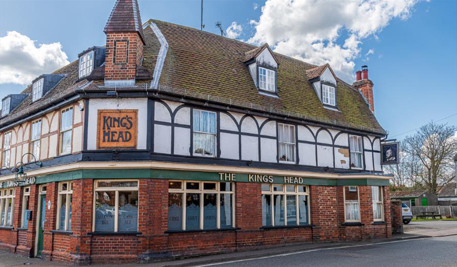 Outside of the King's Head pub in Tollesbury with black beams and dormer windows