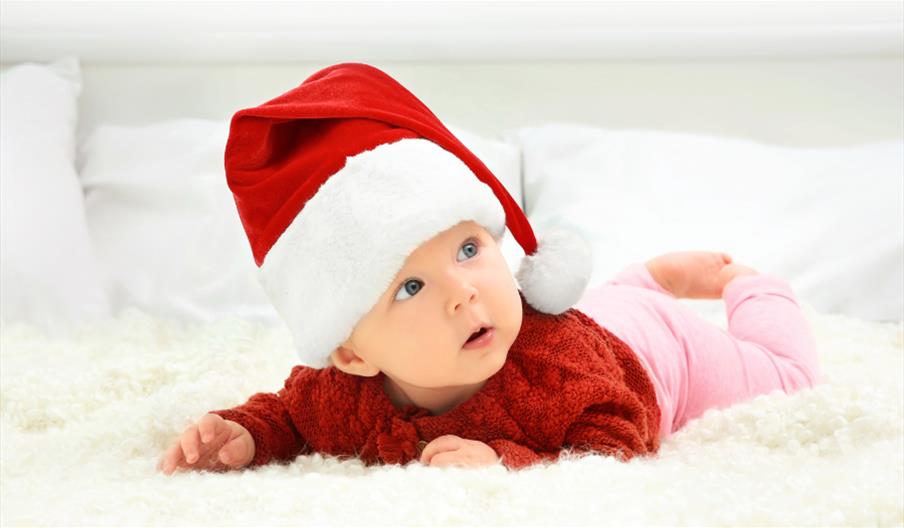Cute baby in Santa hat