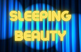 Sleeping Beauty sign in front of theatre curtains