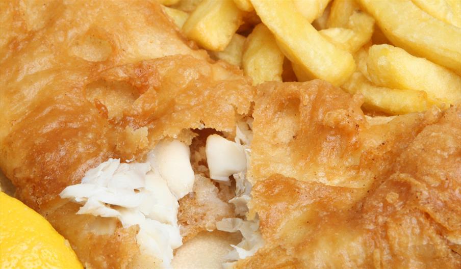 close up of tasty fish and chips