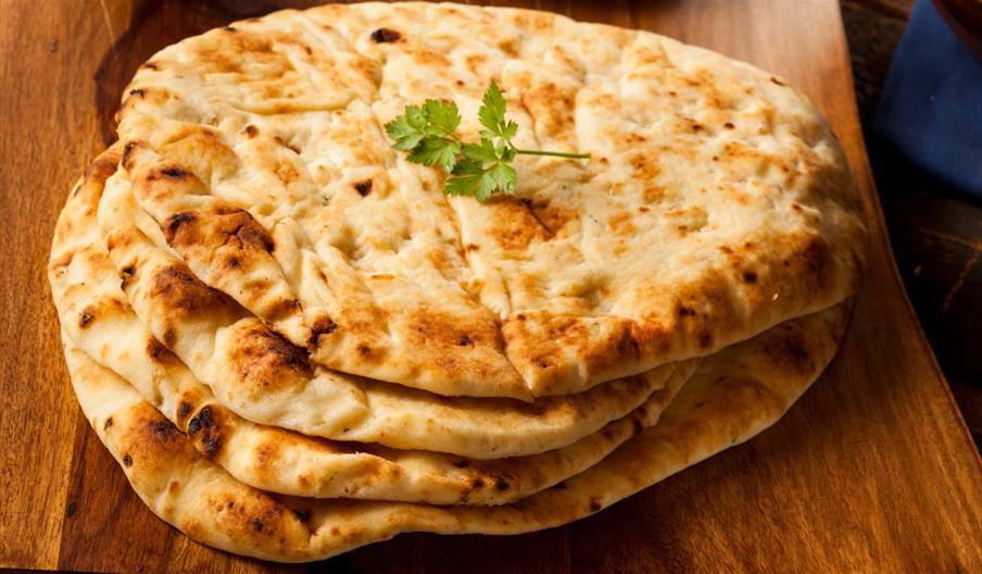 Pile of hot Indian naan breads