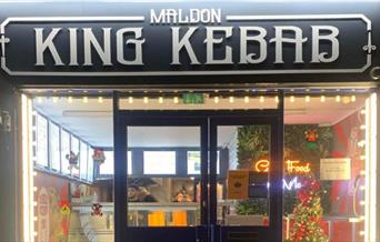 Outside of Maldon King Kebab looking through windows