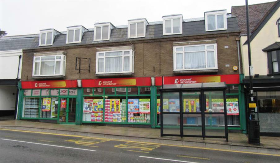 Outside of Poundstretcher in Maldon High Street with red and green colour scheme