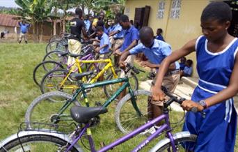 African children learning bike maintenance