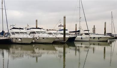 Row of yachts moored on River Crouch