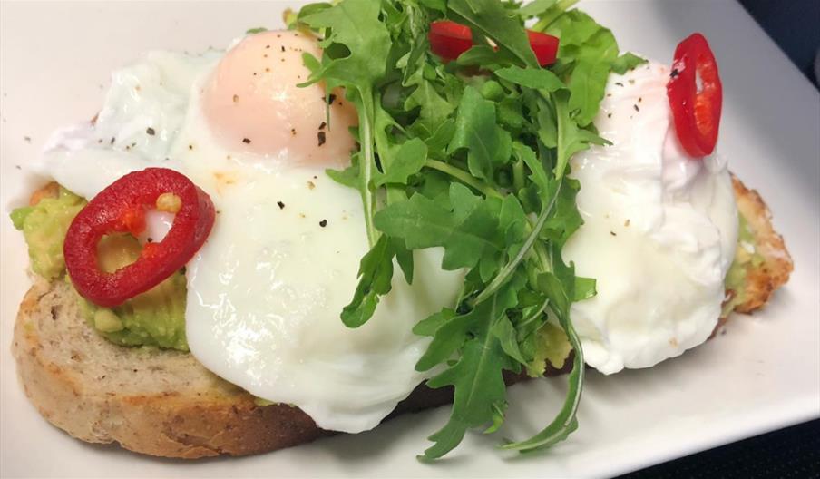 Avocado and poached eggs on toast at Forget Me Not Tearooms