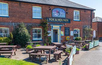 Fox and hounds pub on the village green, photo by James Crisp