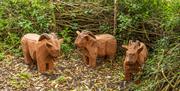 Carved wooden goats at Jubilee Woods, photo James Crisp