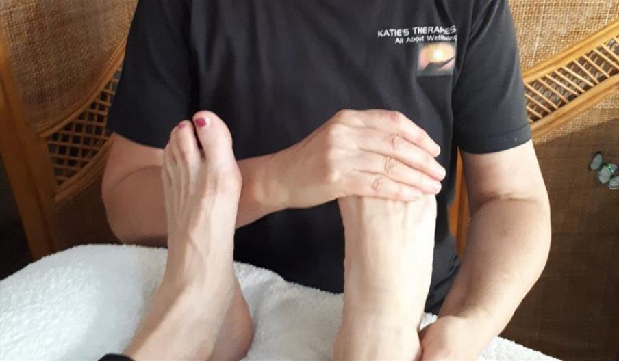 Person having reflexology at Katie's Therapies
