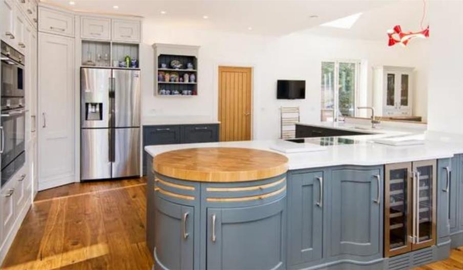 Grey and white designer kitchen by Marshall Scott