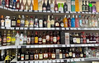 Shelves with alcohol and spirits from around the world at Paul's Express