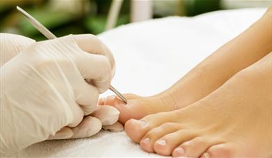Person having foot care treatment