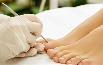 Person having foot care treatment