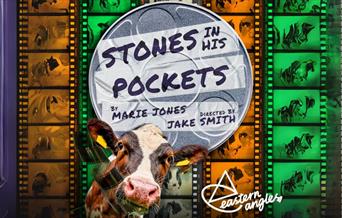 Poster image for Stones In His Pockets - in the background are columns of film rolls in the green, orange and white of the Irish flag. In the centre