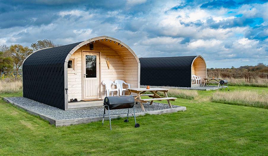 Outside our 2 glamping pods, field, holiday accommodation, Bramble Hall Farm