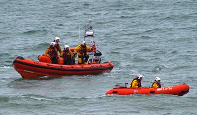 A pair of lifeboats at sea