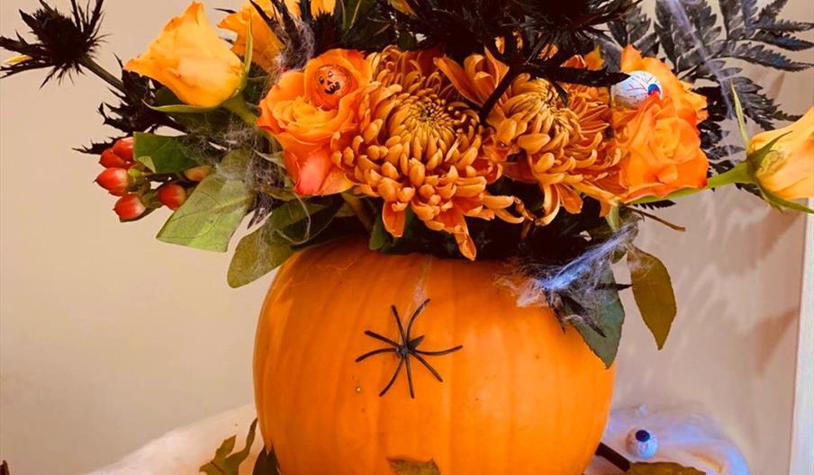 halloween pumpkin flower arrangement